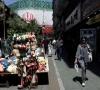 an iranian woman walks on a street after u s and iranian officials said they had reached a deal to end their war and reopen the strait of hormuz in tehran iran june 15 2026 photo wana west asia news agency via reuters