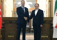 iran s foreign minister abbas araghchi r shakes hands with turkiye s foreign minister hakan fidan during press conference in tehran on november 30 2025 photo afp