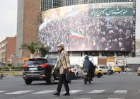 an iranian woman walks on a street in tehran iran january 15 2026 majid asgaripour wana west asia news agency via reuters