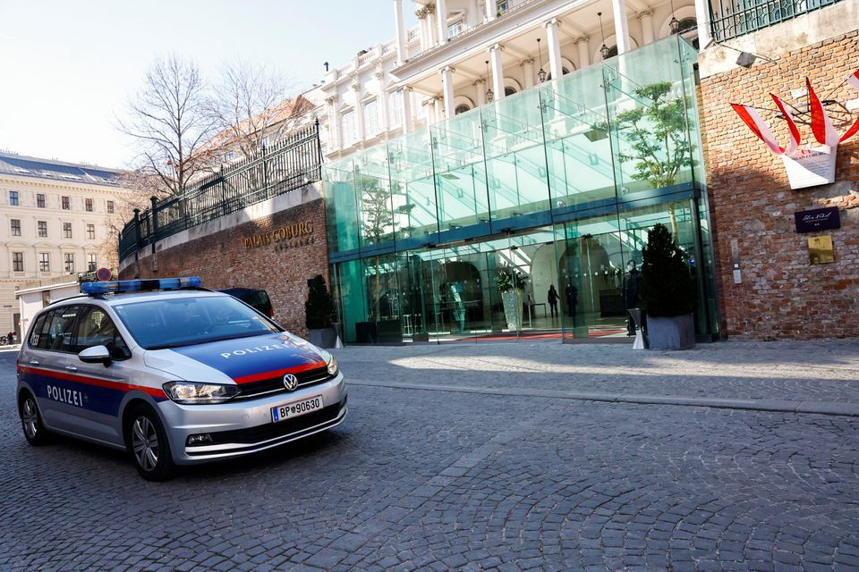 a police car passes the palais coburg where closed door nuclear talks with iran will take place in vienna austria march 11 2022 photo reuters