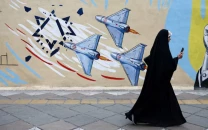 iran murals project defiance in war with us