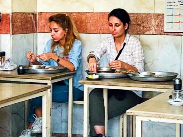 a picture on social media showed donya rad sitting in a traditional tehran restaurant apparently eating breakfast photo twitter dinarad86