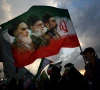 a man holds a flag with a picture of late leader of the islamic revolution ayatollah ruhollah khomeini late supreme leader of iran ayatollah ali khamenei and iran s new supreme leader mojtaba khamenei during a rally in tehran on april 29 2026 photo reuters