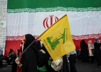 a woman holds a hezbollah flag during a rally in support of iran s supreme leader mojtaba khamenei in tehran iran on june 4 2026 west asia news agency via reuters