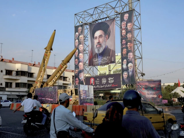 iranian missiles are displayed next to a banner with a picture of iran s supreme leader mojtaba khamenei on a street in tehran photo reuters iranian missiles are displayed next to a banner with a picture of iran s supreme leader mojtaba khamenei on a street in tehran photo reuters