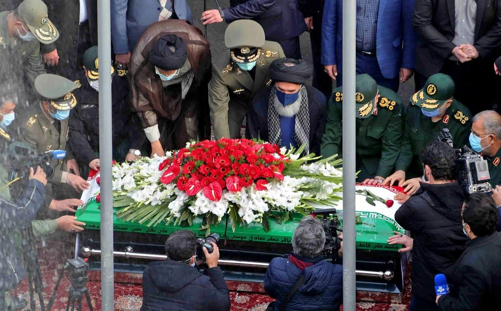 iranian officials pray over the coffin of slain top nuclear scientist mohsen fakhrizadeh during his funeral ceremony in the capital tehran in a picture supplied by the conutry s defence ministry photo iranian defence ministry