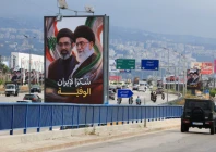 cars and motorbikes drive past billboards showing iran s new supreme leader ayatollah mojtaba khamenei and his late father ali khamenei with the slogan thank you to loyal iran erected along the highway leading to rafic hariri international airport in beirut lebanon june 22 2026 photo reuters