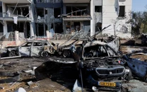 iran fires 20 missiles in strikes on israeli military sites leaving two injured iran fires 20 missiles in strikes on israeli military sites leaving two injured