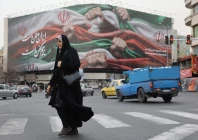 an iranian woman walks on a street in tehran iran january 19 2026 photo wana reuters