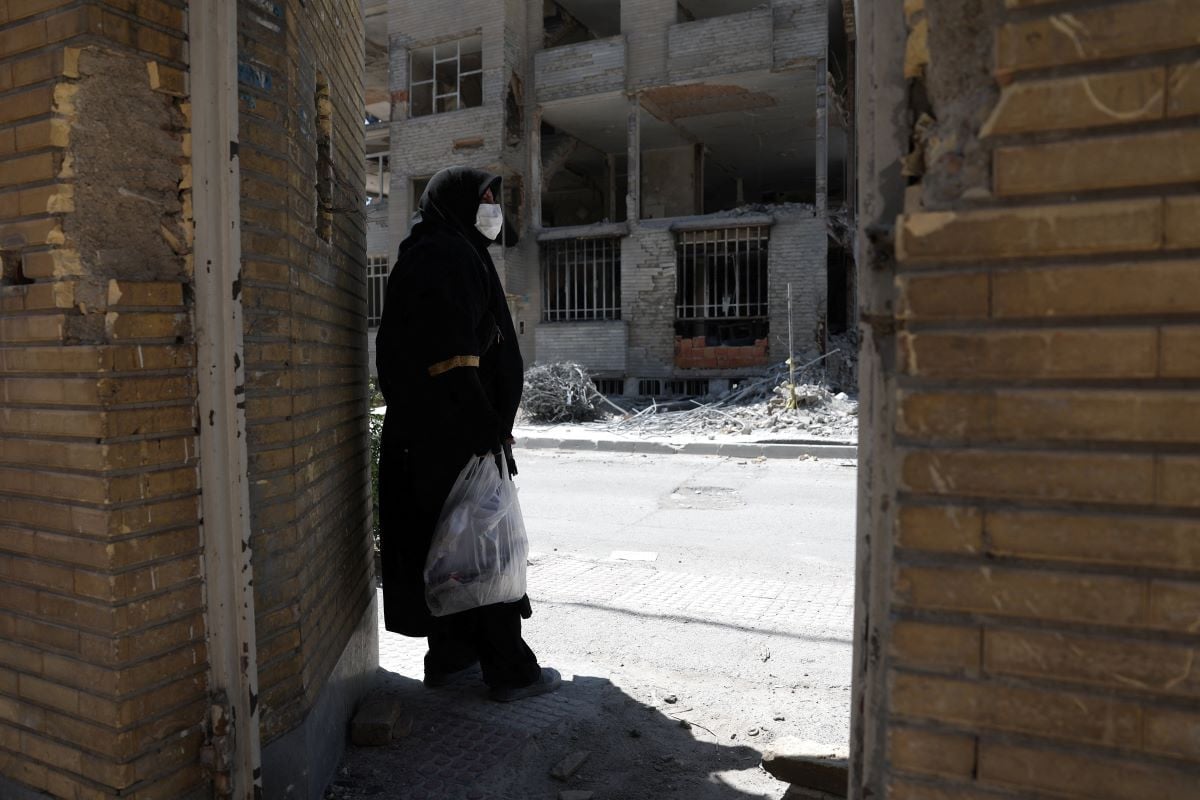 A woman looks at the rubble of her house, which was damaged in a U.S. and Israeli strike in March, in Tehran, Iran June 7, 2026. Majid Asgaripour/WANA (West Asia News Agency) via REUTERS