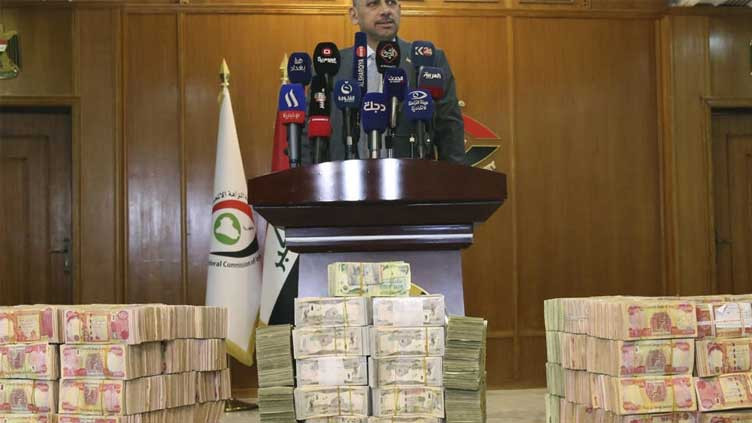 iraq says ex official returned fraction of stolen billions photo afp