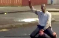 a man sits on the chest of a victim as he attacks him with a knife in belfast northern ireland june 8 2026 in this screengrab obtained from a social media video social media via reuters