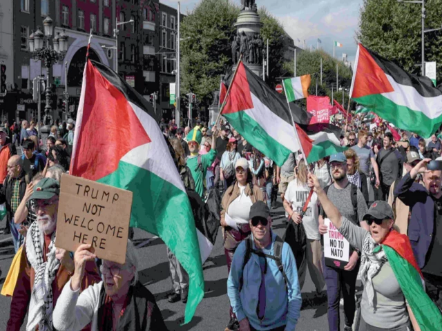 people take part in a protest against the visit of us president donald trump in the irish capital dublin photo afp people take part in a protest against the visit of us president donald trump in the irish capital dublin photo afp