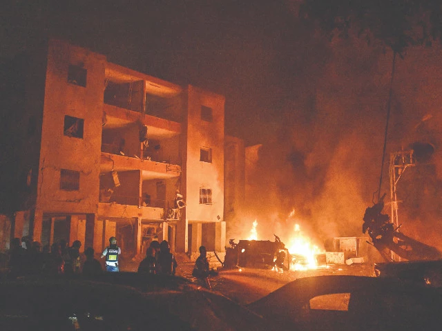 emergency personnel operate after missiles launched from iran hit a target in haifa israel photo reuters