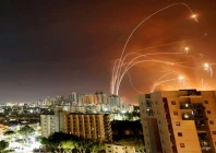 streaks of light are seen as israel s iron dome anti missile system intercepts rockets launched from the gaza strip towards israel as seen from ashkelon israel may 12 reuters