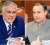 foreign minister ishaq dar and maritime affairs minister junaid anwar chaudhry photos files