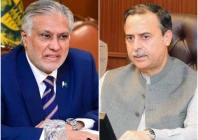 foreign minister ishaq dar and maritime affairs minister junaid anwar chaudhry photos files
