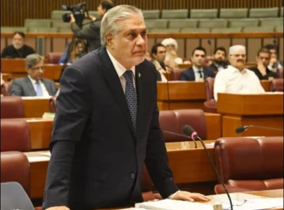 dar reminds iran of pak saudi defence pact