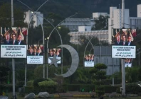 screens display images of pakistan s president asif ali zardari prime minister shehbaz sharif and iran s president masoud pezeshkian ahead of his visit in islamabad pakistan june 22 2026 photo reuters
