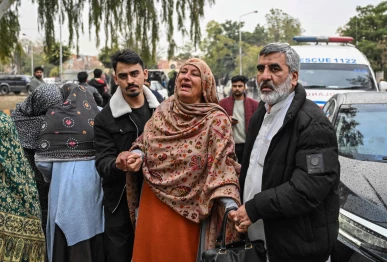 people mourn the death of their relatives following a suicide bombing at a shiite mosque outside a hospital in islamabad on february 6 2026 a suicide bombing at a shiite mosque in pakistan s capital islamabad killed at least 31 people on february 6 local authorities said with a police source saying more than 130 were wounded photo afp