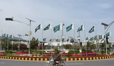 pakistani flags installed in front of the president s house as pakistan prepares to host the us and iran for the second phase of peace talks in islamabad on april 18 2026 photo reuters