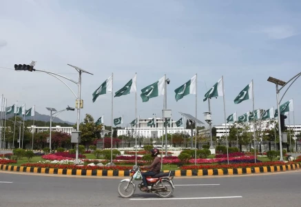 pakistani flags installed in front of the president s house as pakistan prepares to host the us and iran for the second phase of peace talks in islamabad on april 18 2026 photo reuters