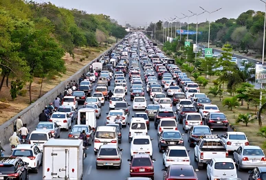 a view of a massive traffic jam clogs the islamabad expressway with a seemingly endless queues of cars buses and motorcycles stretching as far as the eye can see photo app