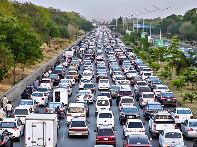a view of a massive traffic jam clogs the islamabad expressway with a seemingly endless queues of cars buses and motorcycles stretching as far as the eye can see photo app