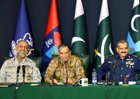 rear admiral shifaat ali khan l dg ispr lieutenant general ahmed sharif chaudhry c and air vice marshal tariq ghazi during a press conference on may 7 2026 screengrab