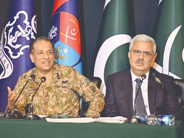 dg ispr lt gen ahmed sharif chaudhry and interior secretary muhammad khurram agha brief the media in islamabad photo online