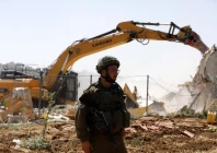 an israeli soldier with bulldozer in the occupied gaza photo qatar tribune