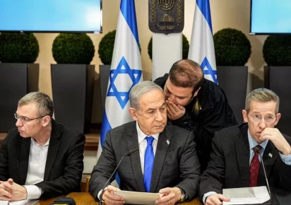benjamin netanyahu center at a cabinet meeting at the israeli ministry of defense tel aviv december 24 2023 file photo afp