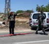israeli emergency personnel work at the scene of what israeli police say was a series of shooting attacks in central israel june 7 2026 reuters