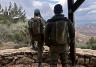 israeli soldiers look towards lebanon amid an escalation between iran backed hezbollah and israel and amid the u s  israeli conflict with iran by the israel lebanon border in northern israel march 7 2026 reuters