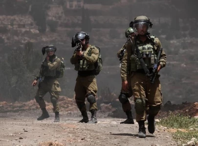 several hurt as israeli forces raid palestinian town in west bank several hurt as israeli forces raid palestinian town in west bank