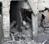 a palestinian man inspects the site of an israeli airstrike on a residential building on tuesday in gaza city on may 27 2026 photo reuters