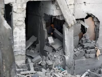 a palestinian man inspects the site of an israeli airstrike on a residential building on tuesday in gaza city on may 27 2026 photo reuters