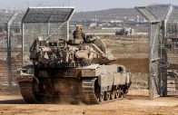 an israeli tank crosses into a buffer zone separating israeli and syrian forces in the golan heights on march 2 2025 file image afp an israeli tank crosses into a buffer zone separating israeli and syrian forces in the golan heights on march 2 2025 file image afp