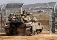 an israeli tank crosses into a buffer zone separating israeli and syrian forces in the golan heights on march 2 2025 file image afp