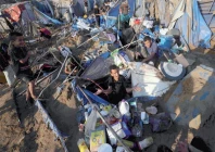 humanitarian crisis a displaced palestinian reacts as he sits on the sand amongst the remains of his tent home following an israeli airstrike that targeted the nearby medical supplies and pharmaceuticals warehouse of al aqsa martyrs hospital in deir al balah central gaza strip photo afp humanitarian crisis a displaced palestinian reacts as he sits on the sand amongst the remains of his tent home following an israeli airstrike that targeted the nearby medical supplies and pharmaceuticals warehouse of al aqsa martyrs hospital in deir al balah central gaza strip photo afp