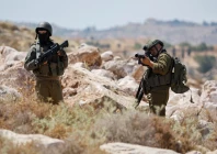 an israeli troop aims his weapon during a protest against a settlement near hebron in the israeli occupied west bank june 9 2026 reuters