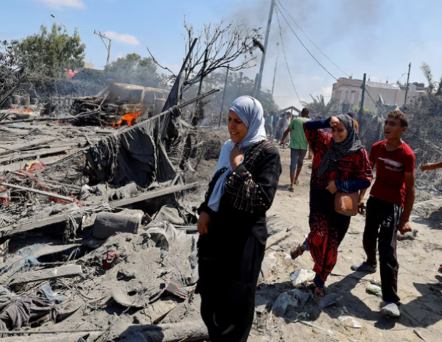 palestinians react near damage following what palestinians say was an israeli strike at a tent camp in al mawasi area amid israel hamas conflict in khan younis in the southern gaza strip july 13 2024 photo reuters
