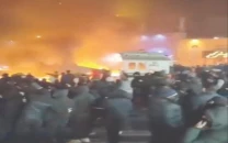 iran digs in as protests escalate nationwide