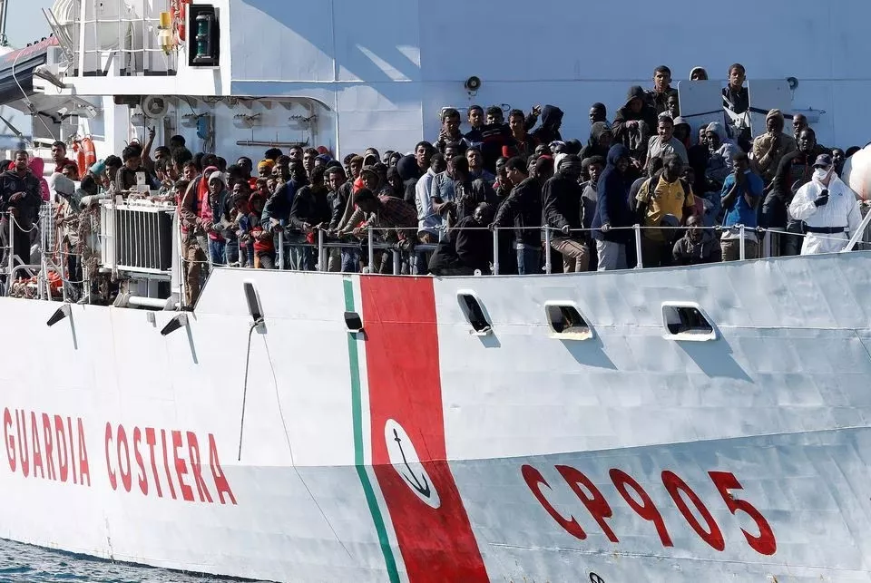 migrants arrive by the italian coastguard vessel peluso in the sicilian harbour of augusta italy may 13 2016 photo reuters file migrants arrive by the italian coastguard vessel peluso in the sicilian harbour of augusta italy may 13 2016 photo reuters file