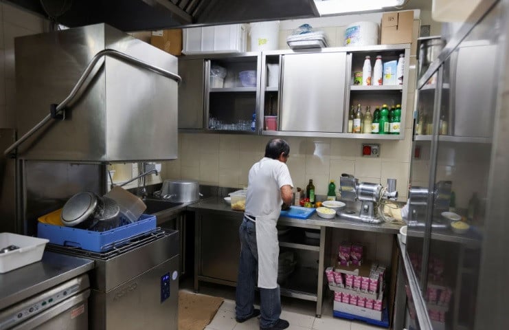 Italy: skilled, educated washing dishes