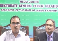 ajk home secretary chaudhry guftar hussain addresses a press conference alongside elementary and secondary education secretary qazi inayat in mirpur on tuesday screengrab