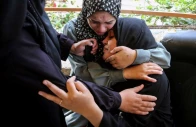 relatives of palestinians from abu taima family who were killed in an israeli strike mourn during their funeral amid the ongoing israel hamas conflict at nasser hospital in khan younis in the southern gaza strip october 15 2024 photo reuters