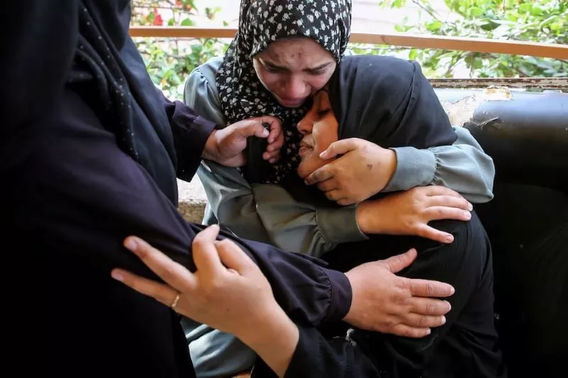 relatives of palestinians from abu taima family who were killed in an israeli strike mourn during their funeral amid the ongoing israel hamas conflict at nasser hospital in khan younis in the southern gaza strip october 15 2024 photo reuters relatives of palestinians from abu taima family who were killed in an israeli strike mourn during their funeral amid the ongoing israel hamas conflict at nasser hospital in khan younis in the southern gaza strip october 15 2024 photo reuters