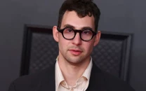 jack antonoff faces backlash for vague ice out pin response at 2026 grammys