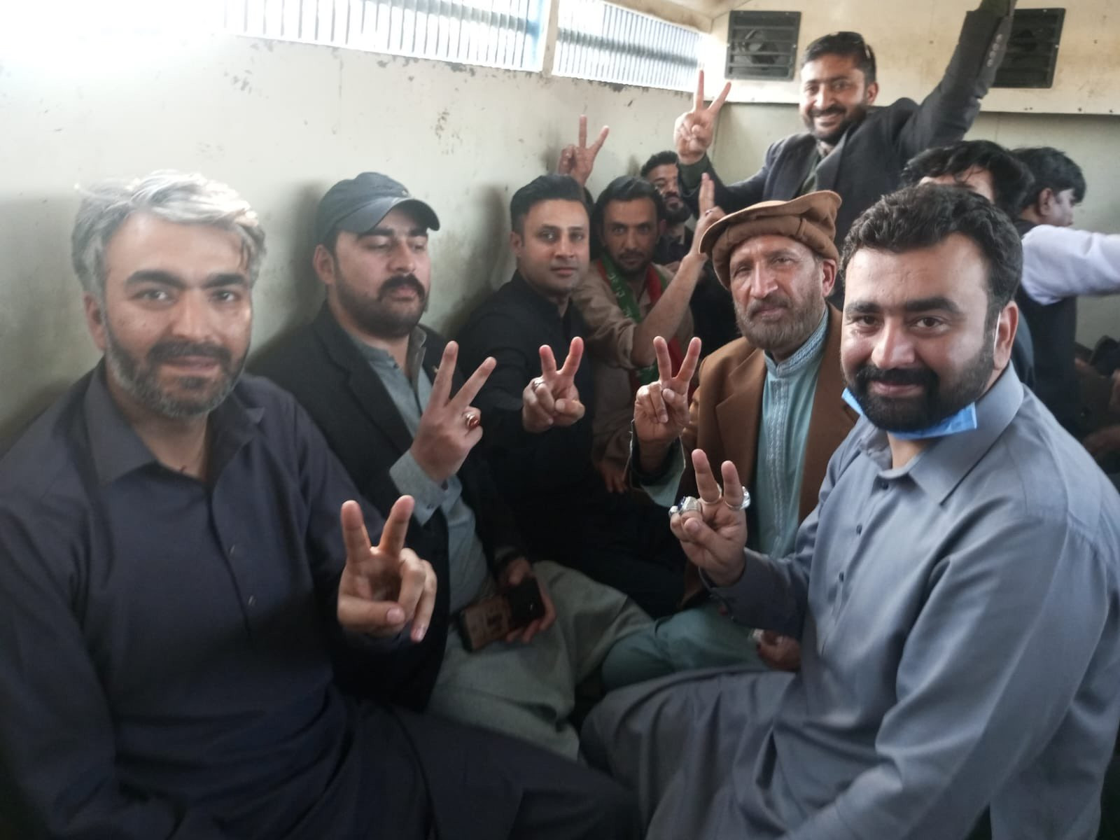 over 150 party activists including five former lawmakers reached the committee chowk in rawalpindi to force themselves into prisoner vans photo twitter ptiofficial